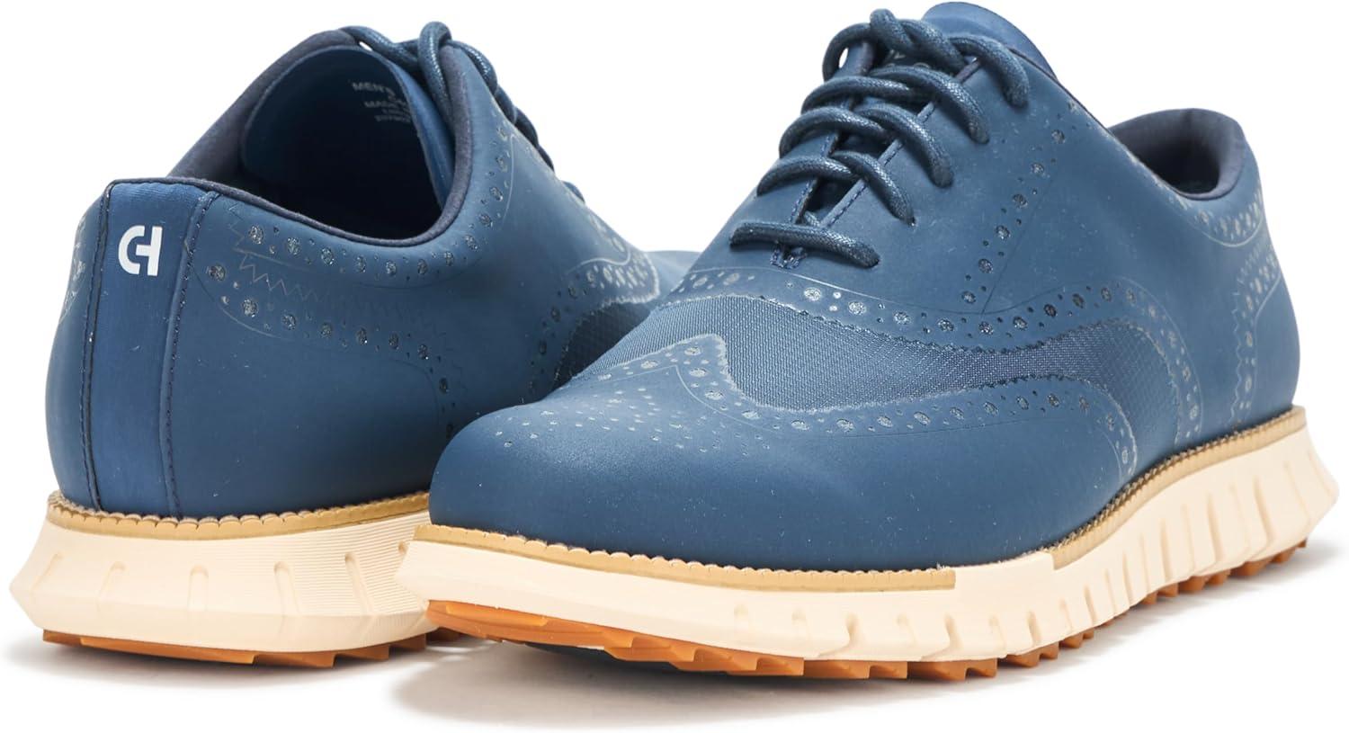imageCole Haan Mens Zerogrand Remastered No Sew Wingtip Golf SneakerBig DipperIvory