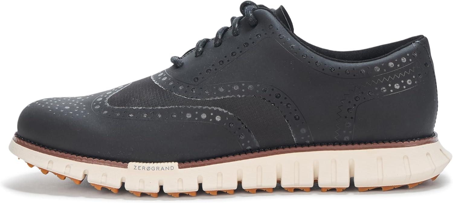 imageCole Haan Mens Zerogrand Remastered No Sew Wingtip Golf SneakerBlackNimbus Cld