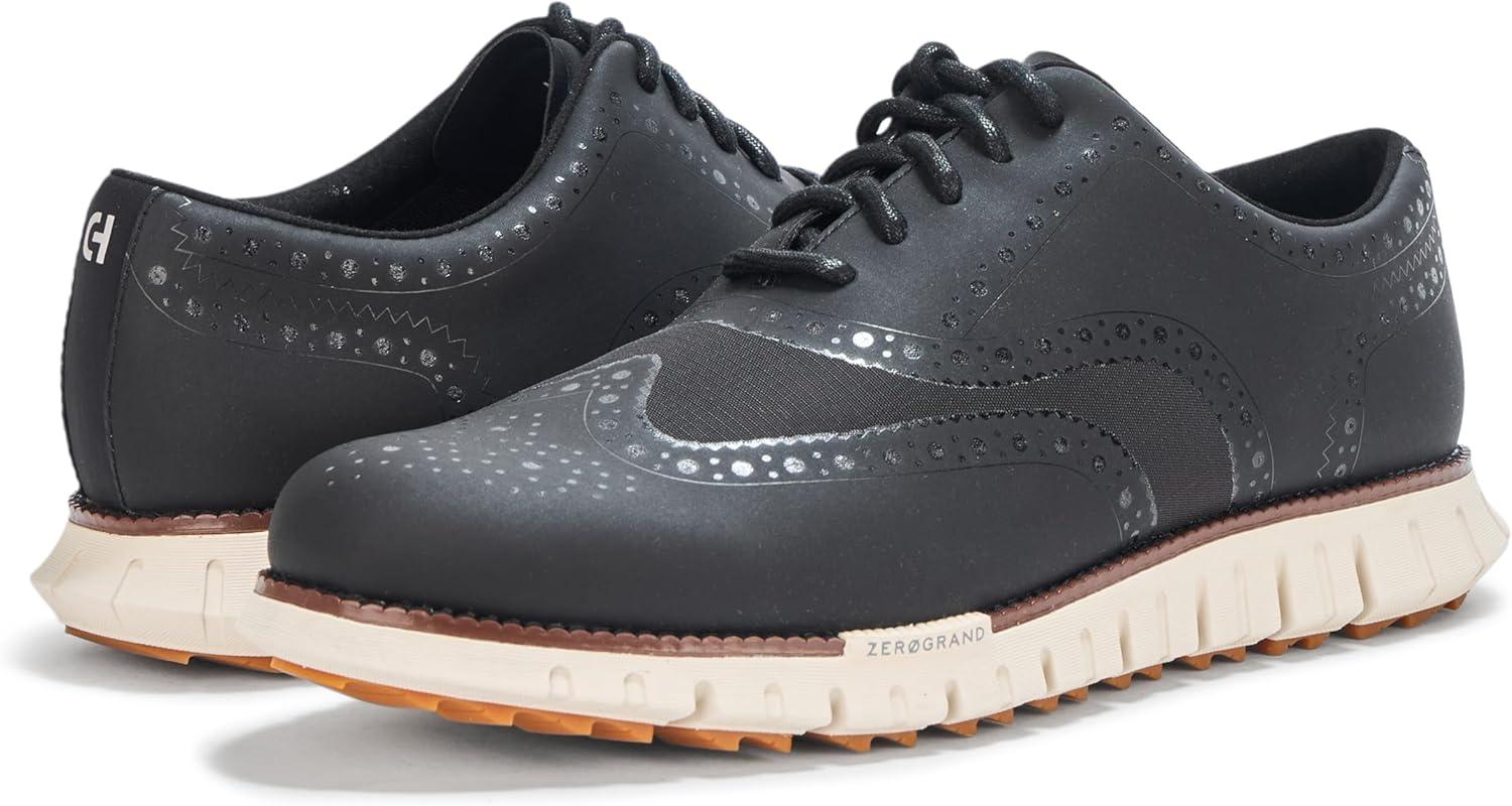 imageCole Haan Mens Zerogrand Remastered No Sew Wingtip Golf SneakerBlackNimbus Cld