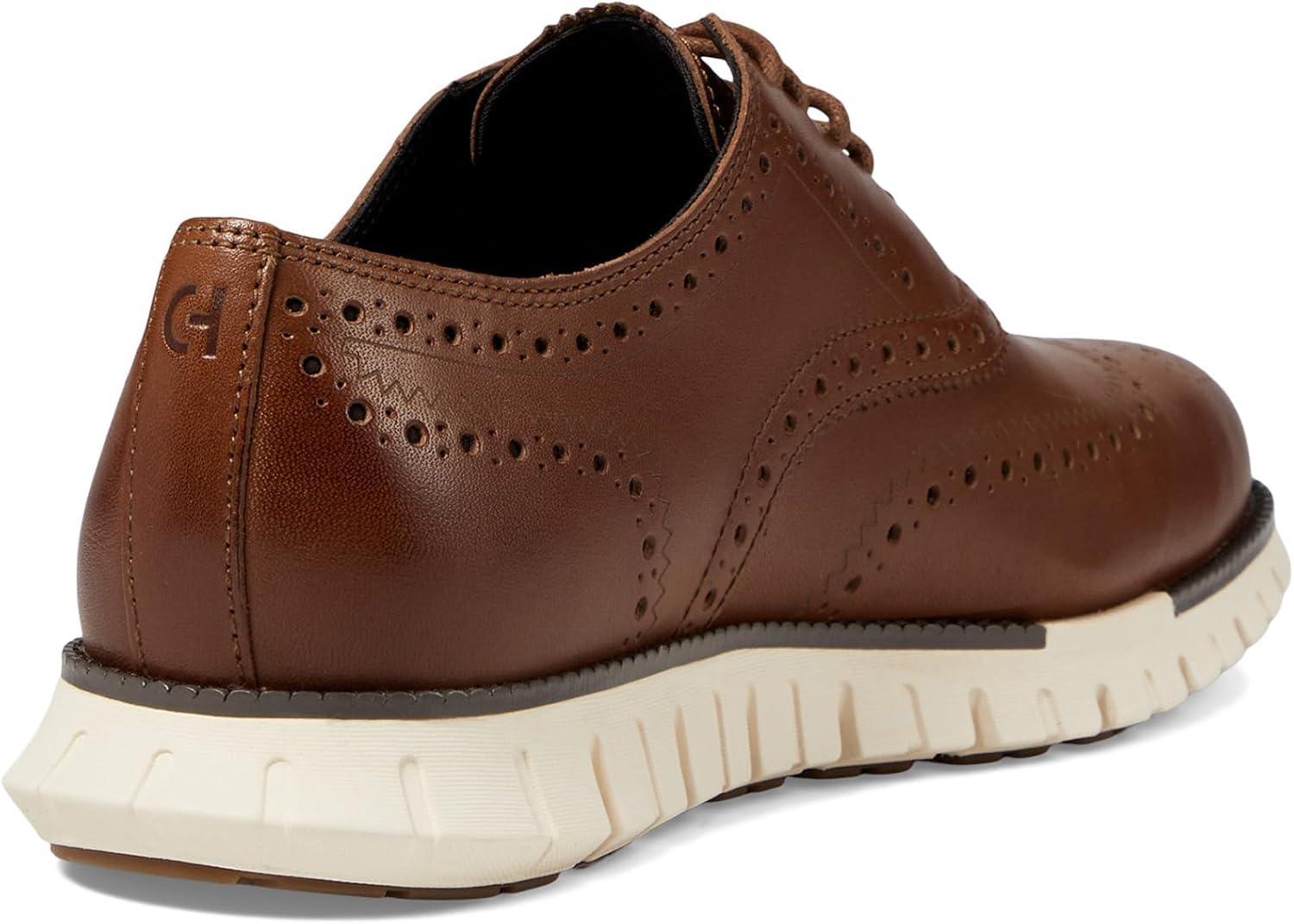 imageCole Haan Mens Zerogrand Remastered Wingtip OxfordsBritish TanIvory