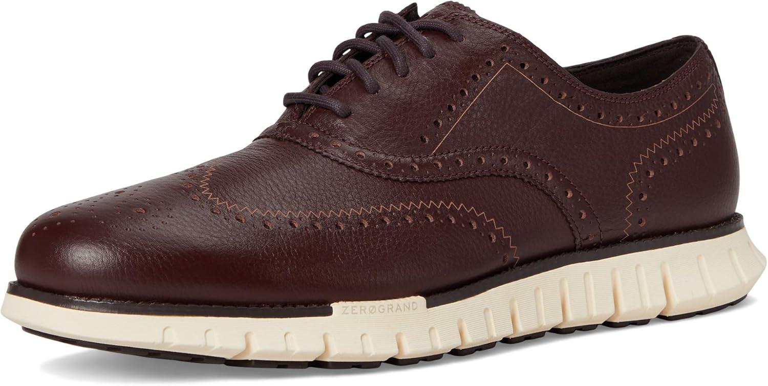 imageCole Haan Mens Zerogrand Remastered Wingtip OxfordsPinotDk ChocolateIvory