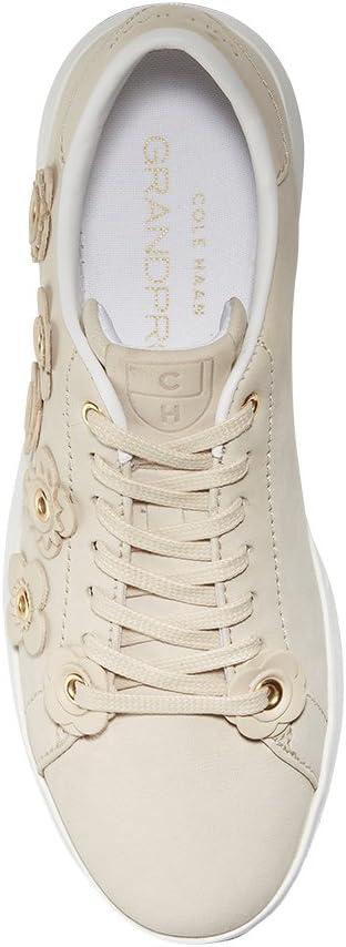 imageCole Haan Womens GrandPro Tennis Leather Lace OX Fashion SneakerBrazilian Sand NubuckBrazilian Sand Leather FlowersOptic White