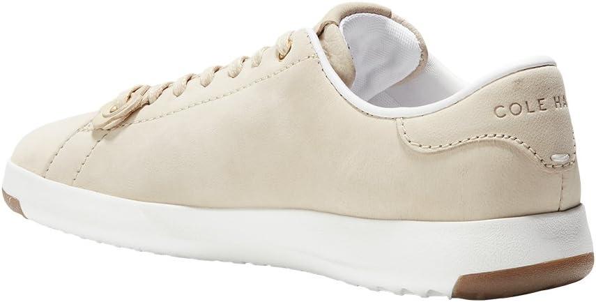 imageCole Haan Womens GrandPro Tennis Leather Lace OX Fashion SneakerBrazilian Sand NubuckBrazilian Sand Leather FlowersOptic White