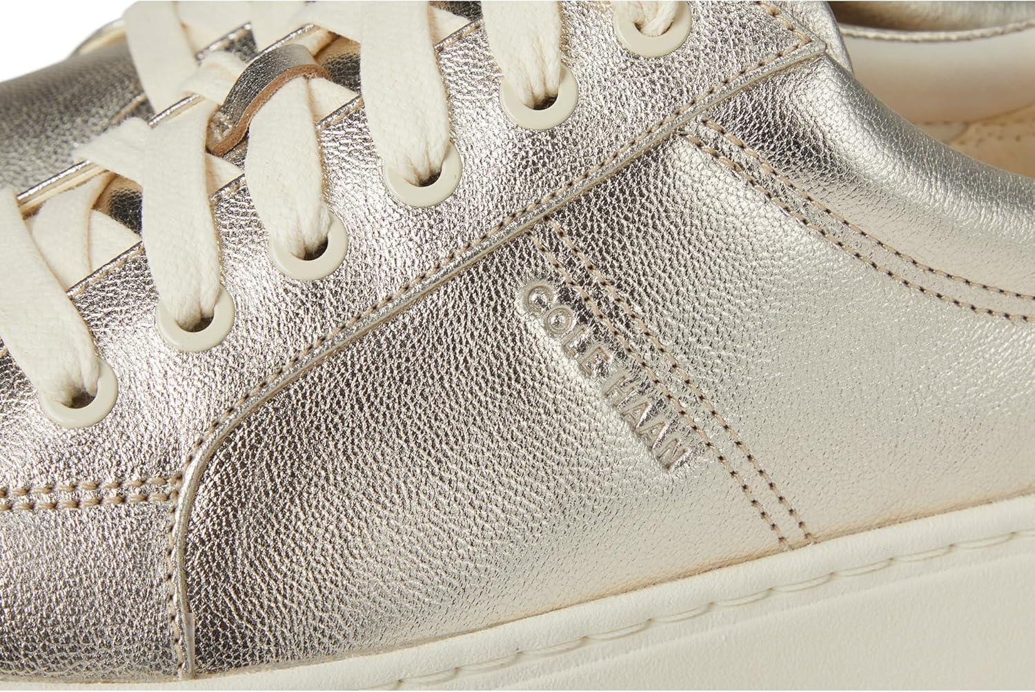 imageCole Haan Womens Grandpro Max Platform SneakerGold MetlcIvry