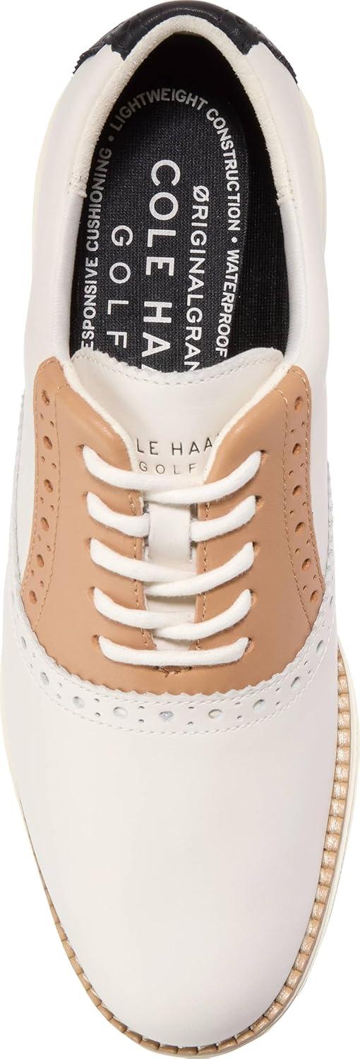 imageCole Haan Womens Original Grand Shortwing Golf OxfordIvryBlkBisctSky