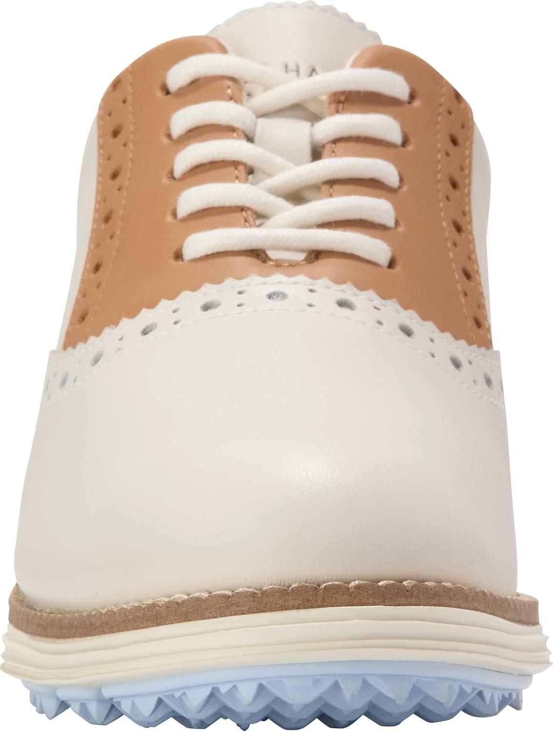 imageCole Haan Womens Original Grand Shortwing Golf OxfordIvryBlkBisctSky