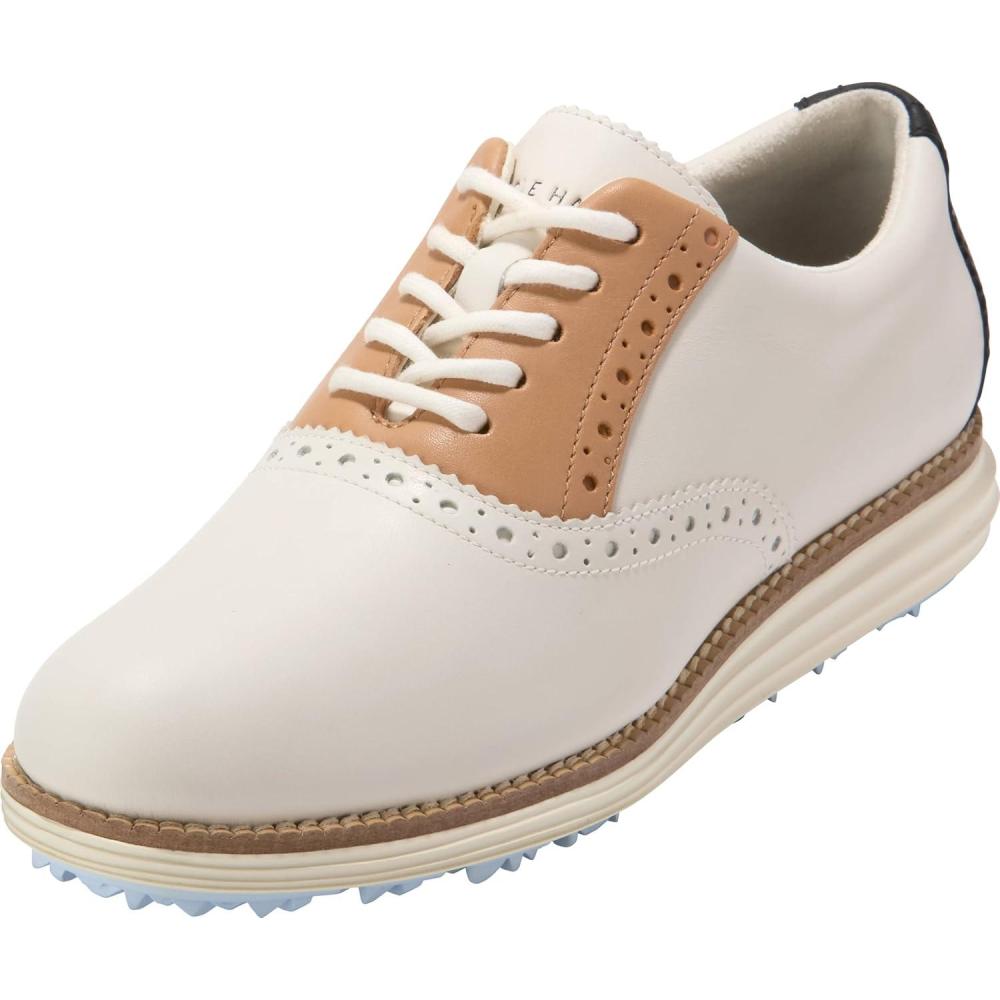imageCole Haan Womens Original Grand Shortwing Golf OxfordIvryBlkBisctSky