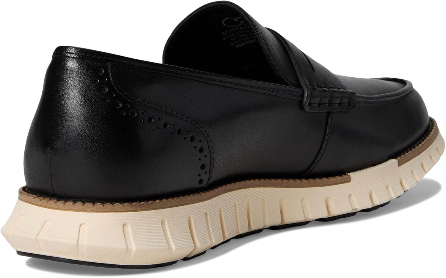 imageCole Haan Mens Zerogrand Remastered Penny LoafersBlackNat TanIvry