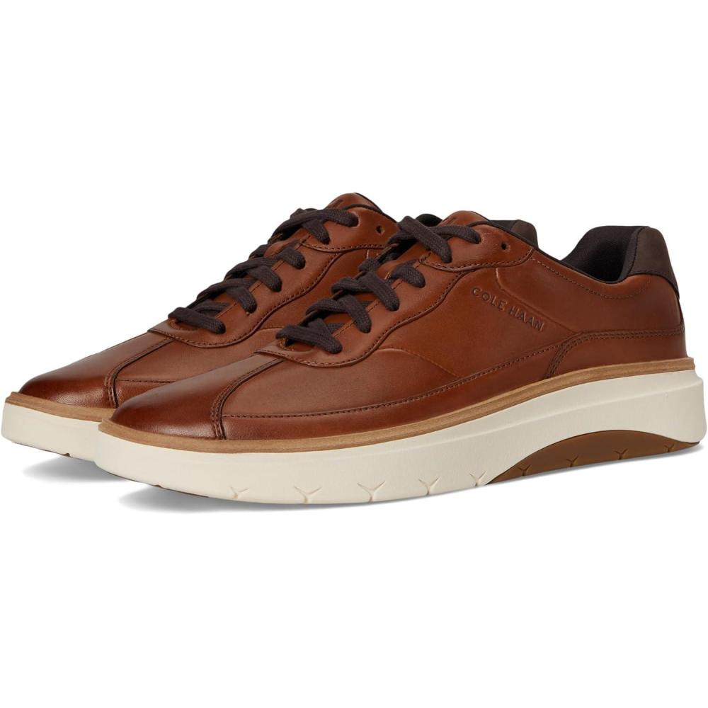imageCole Haan Mens Grandpro Featherarc Bike Toe SneakerBritish TanIvory