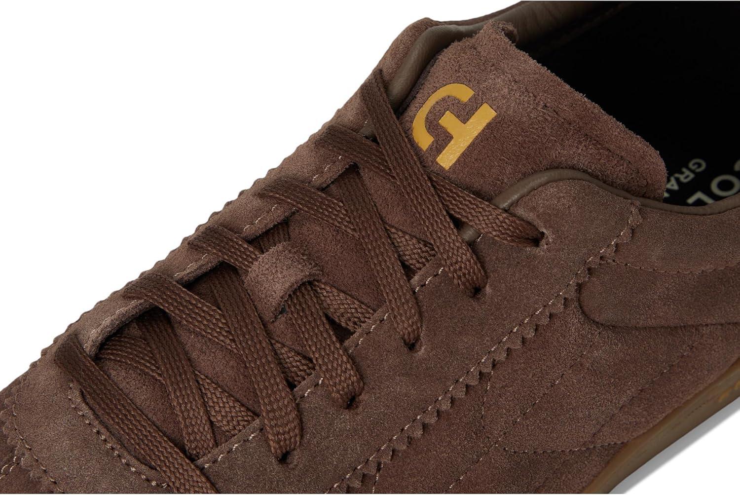 imageCole Haan Mens Grandpro Breakaway SneakerLava SuedeOrzoGolden Honey