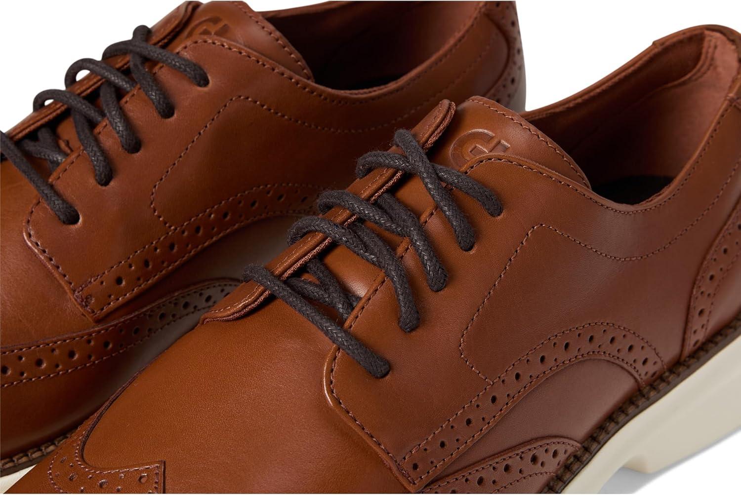 imageCole Haan Mens Grand Shadowlite WingtipBritish TanIvory