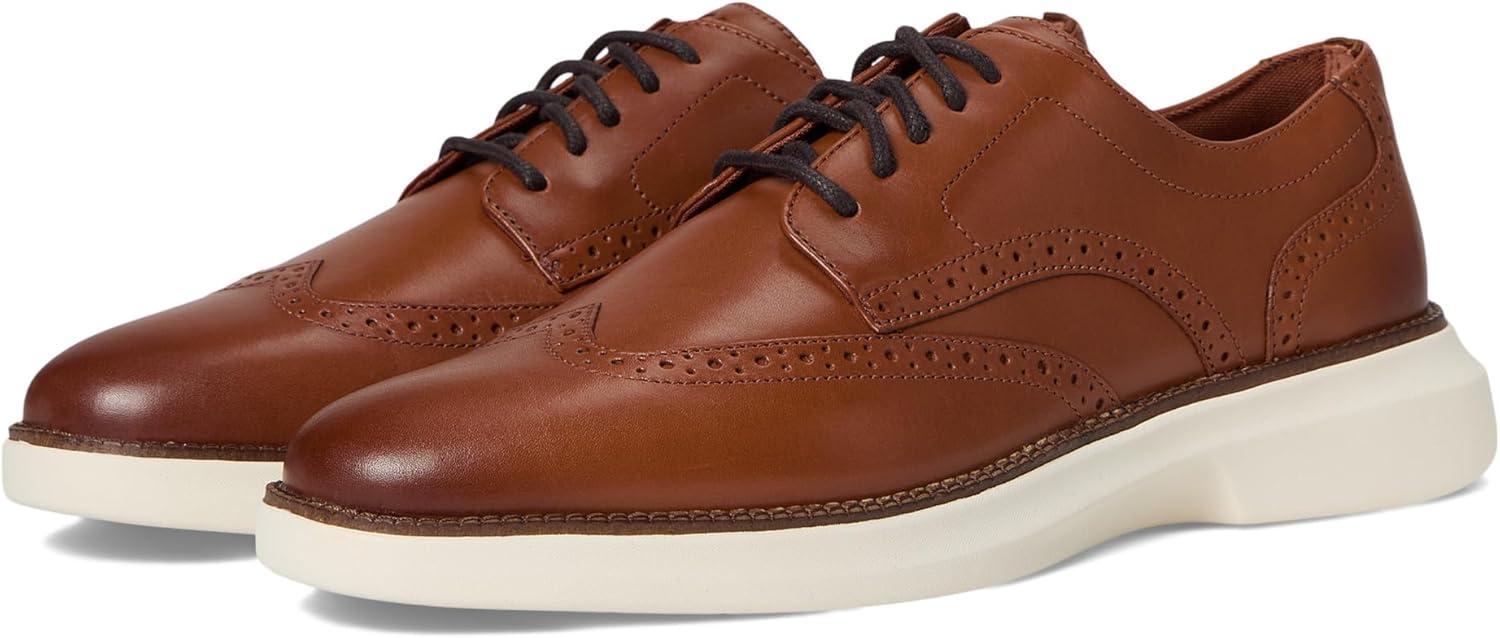 imageCole Haan Mens Grand Shadowlite WingtipBritish TanIvory