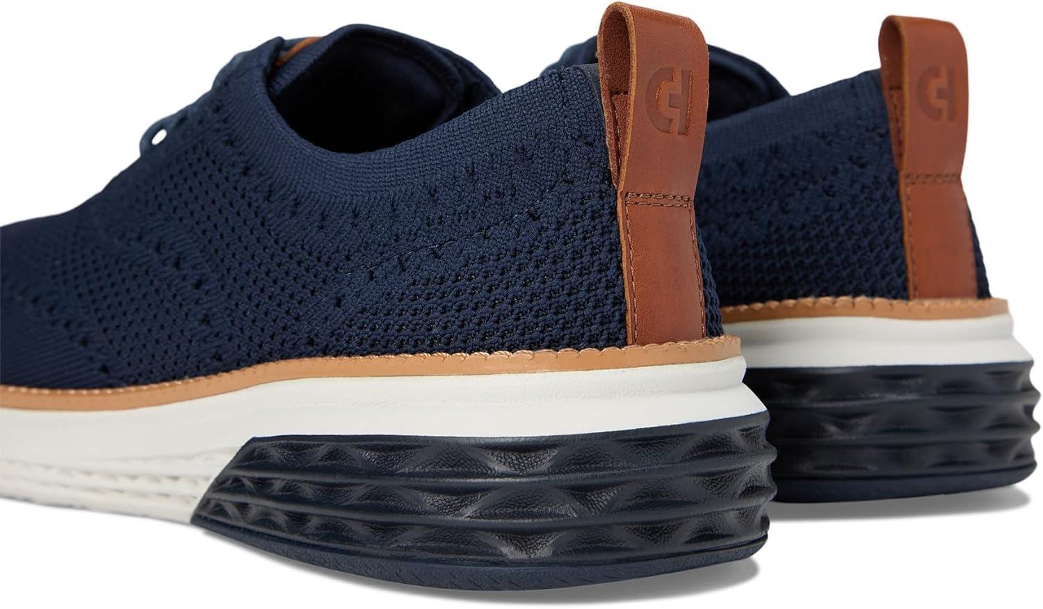 imageCole Haan Mens Grand Hurrion Stitchlite WingtipNavy BlazerBritish Tan