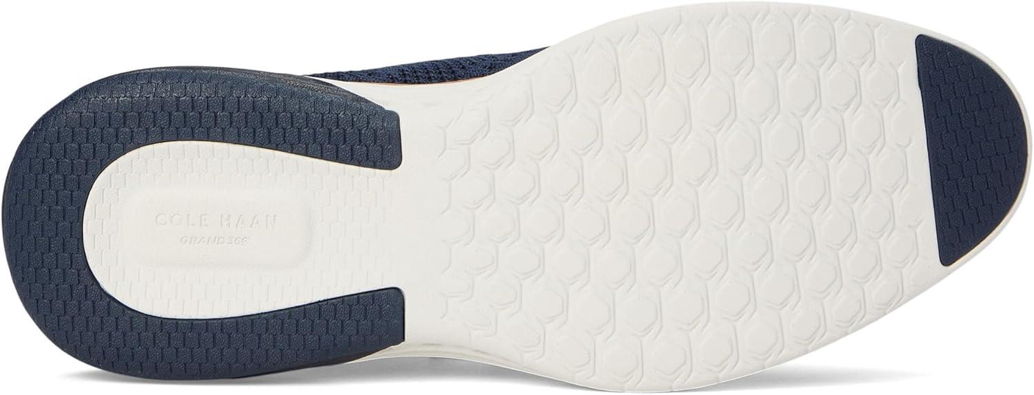 imageCole Haan Mens Grand Hurrion Stitchlite WingtipNavy BlazerBritish Tan