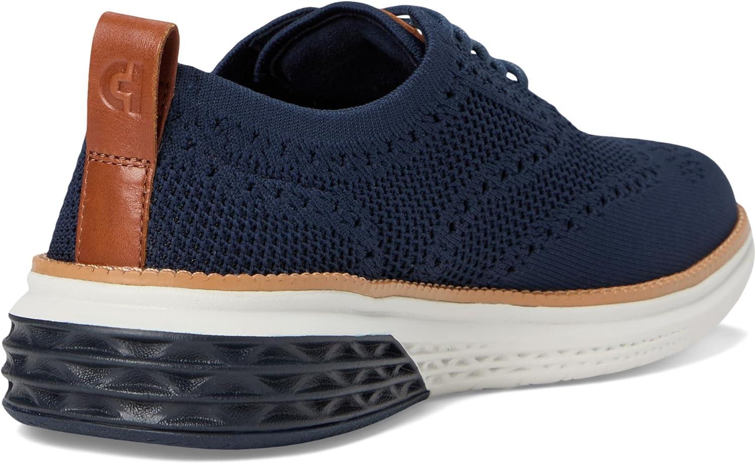imageCole Haan Mens Grand Hurrion Stitchlite WingtipNavy BlazerBritish Tan