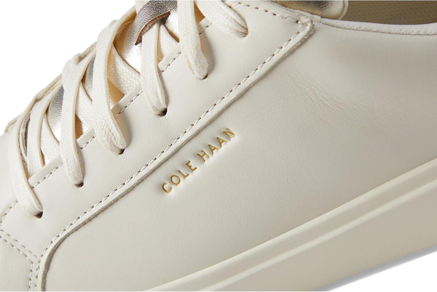 image:imageCole Haan Womens Grand Crosscourt Daily SneakerIvoryGolden Toffee Suede