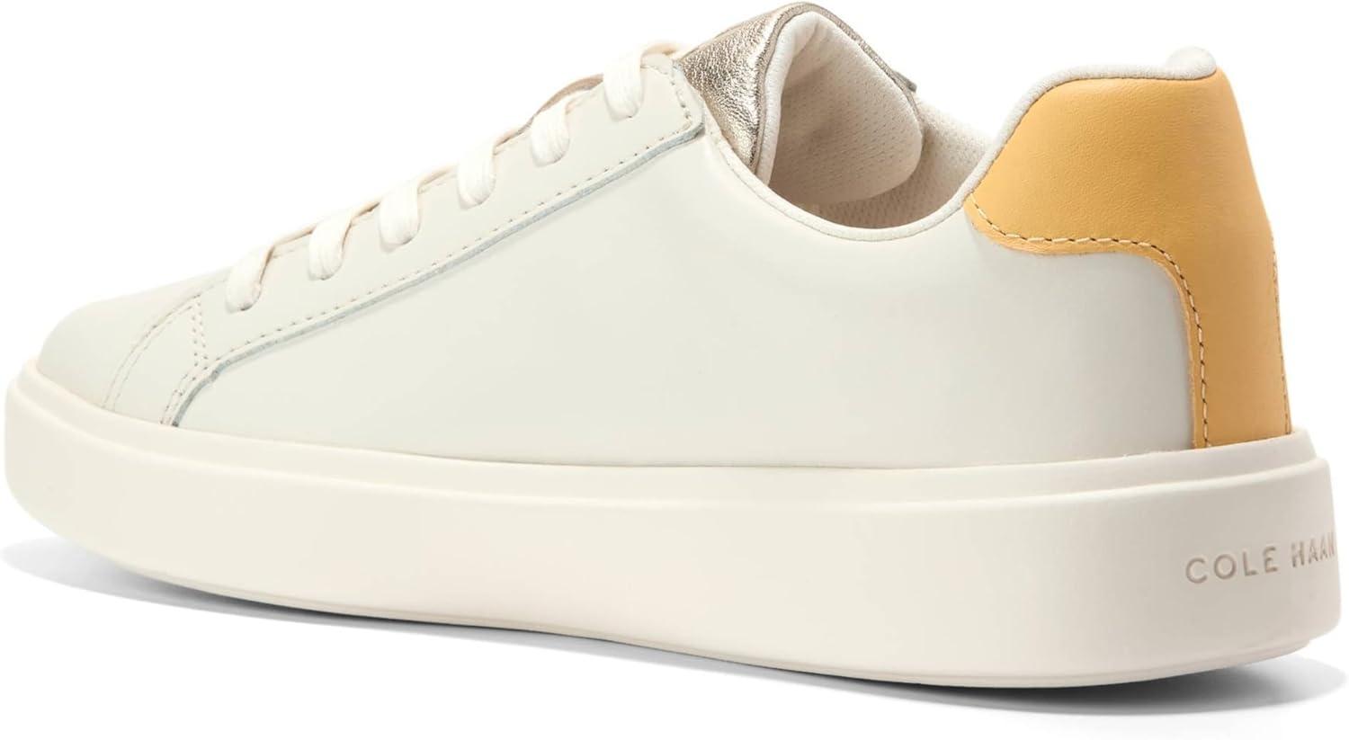 image:imageCole Haan Womens Grand Crosscourt Daily SneakerIvorySunset Gold