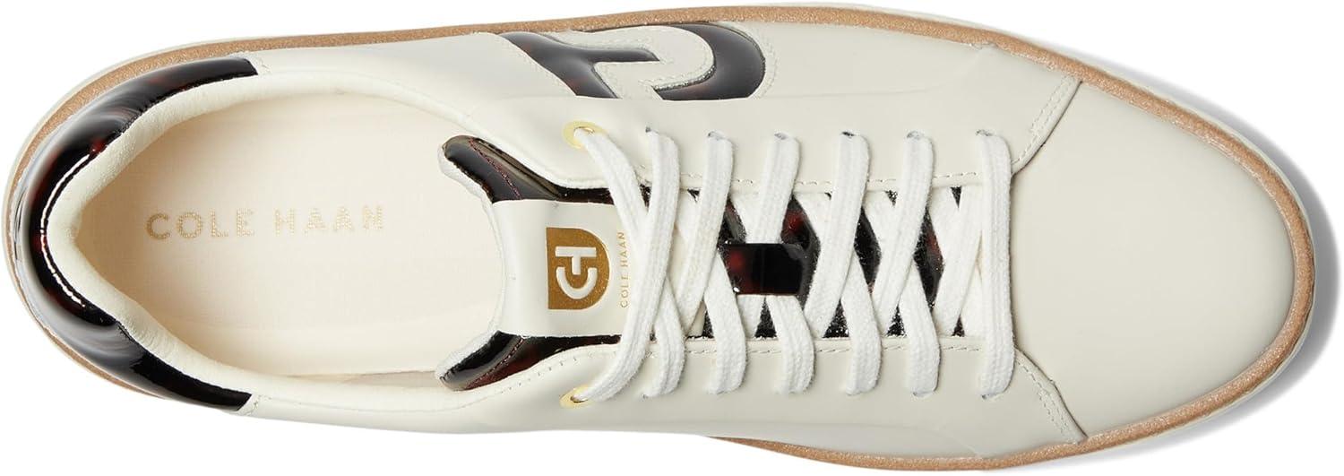 image:imageCole Haan Womens Grandpro Topspin SneakersIvoryTortse Paten
