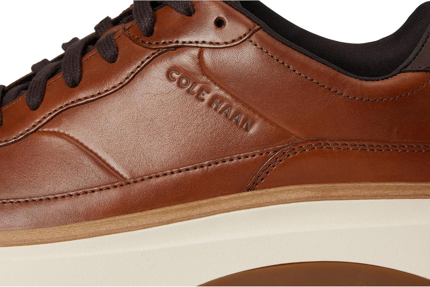 image:imageCole Haan Mens Grandpro Featherarc Bike Toe SneakersBritish TanIvory
