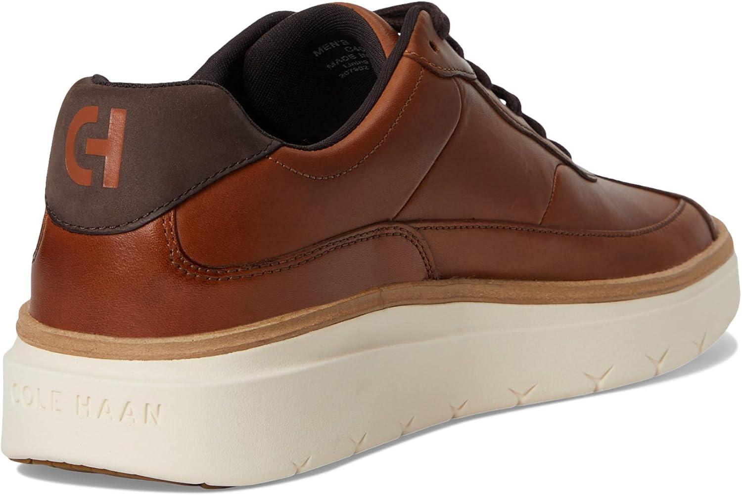 image:imageCole Haan Mens Grandpro Featherarc Bike Toe SneakersBritish TanIvory