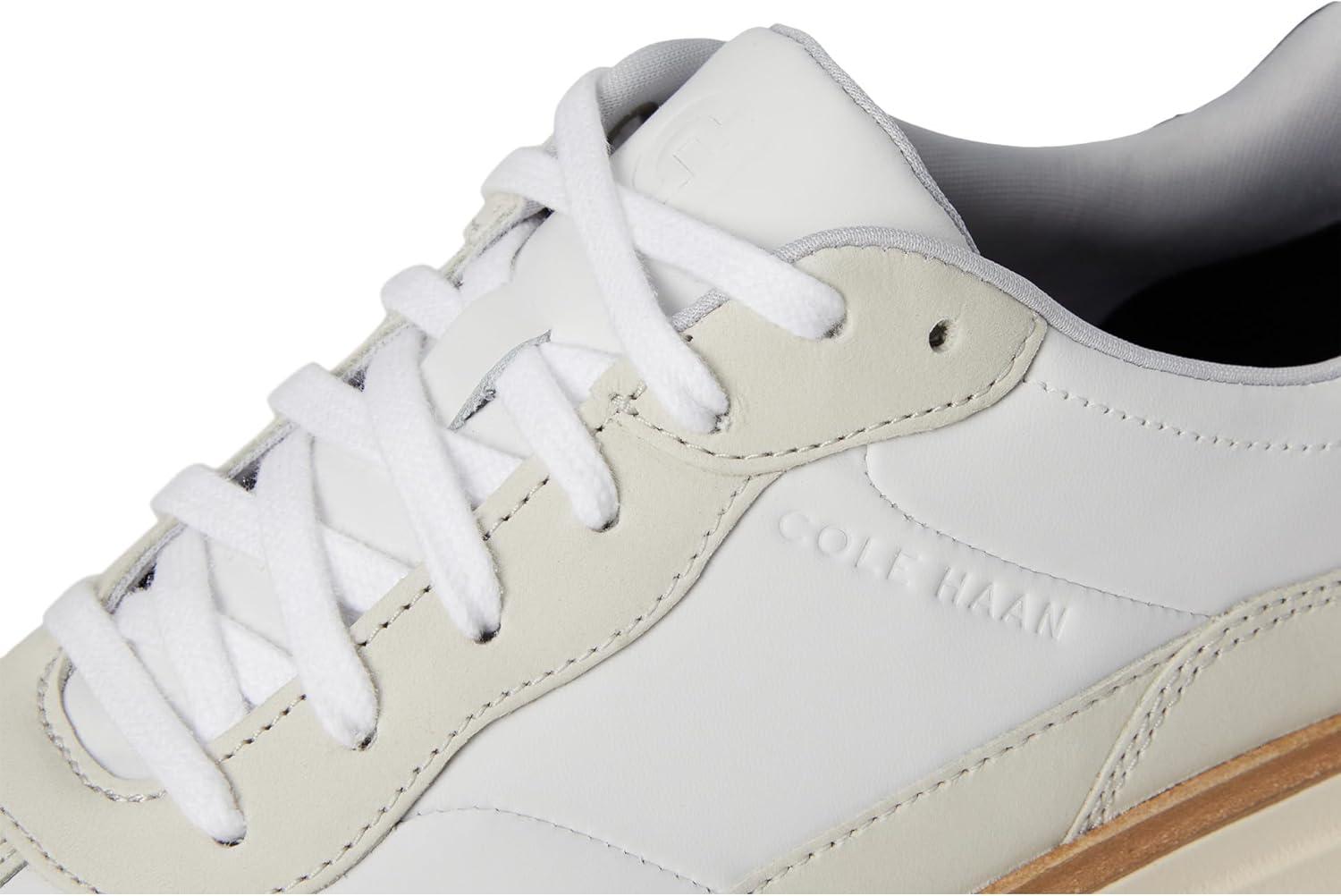 image:imageCole Haan Mens Grandpro Featherarc Bike Toe SneakersWhiteBlackIvory