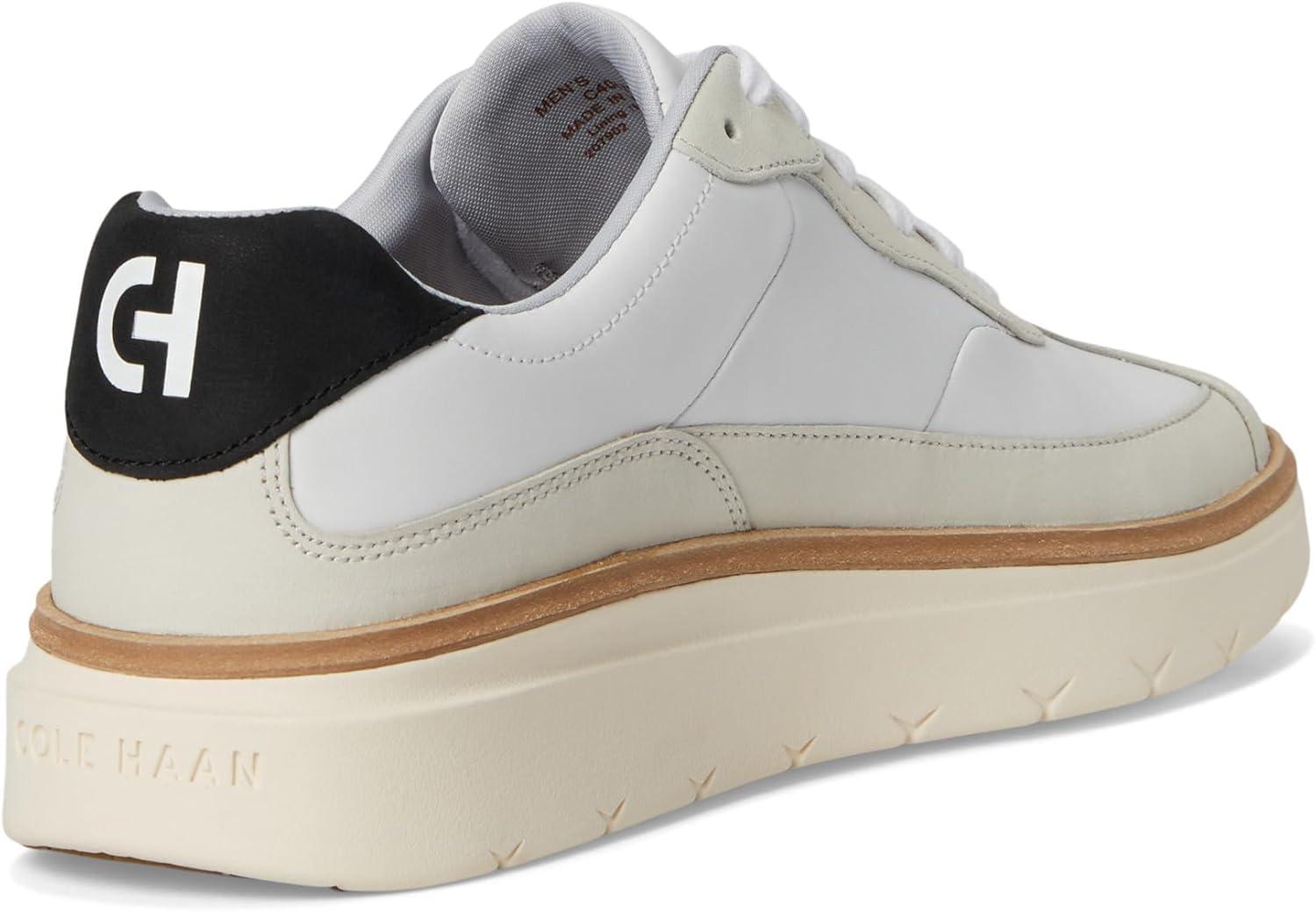 image:imageCole Haan Mens Grandpro Featherarc Bike Toe SneakersWhiteBlackIvory