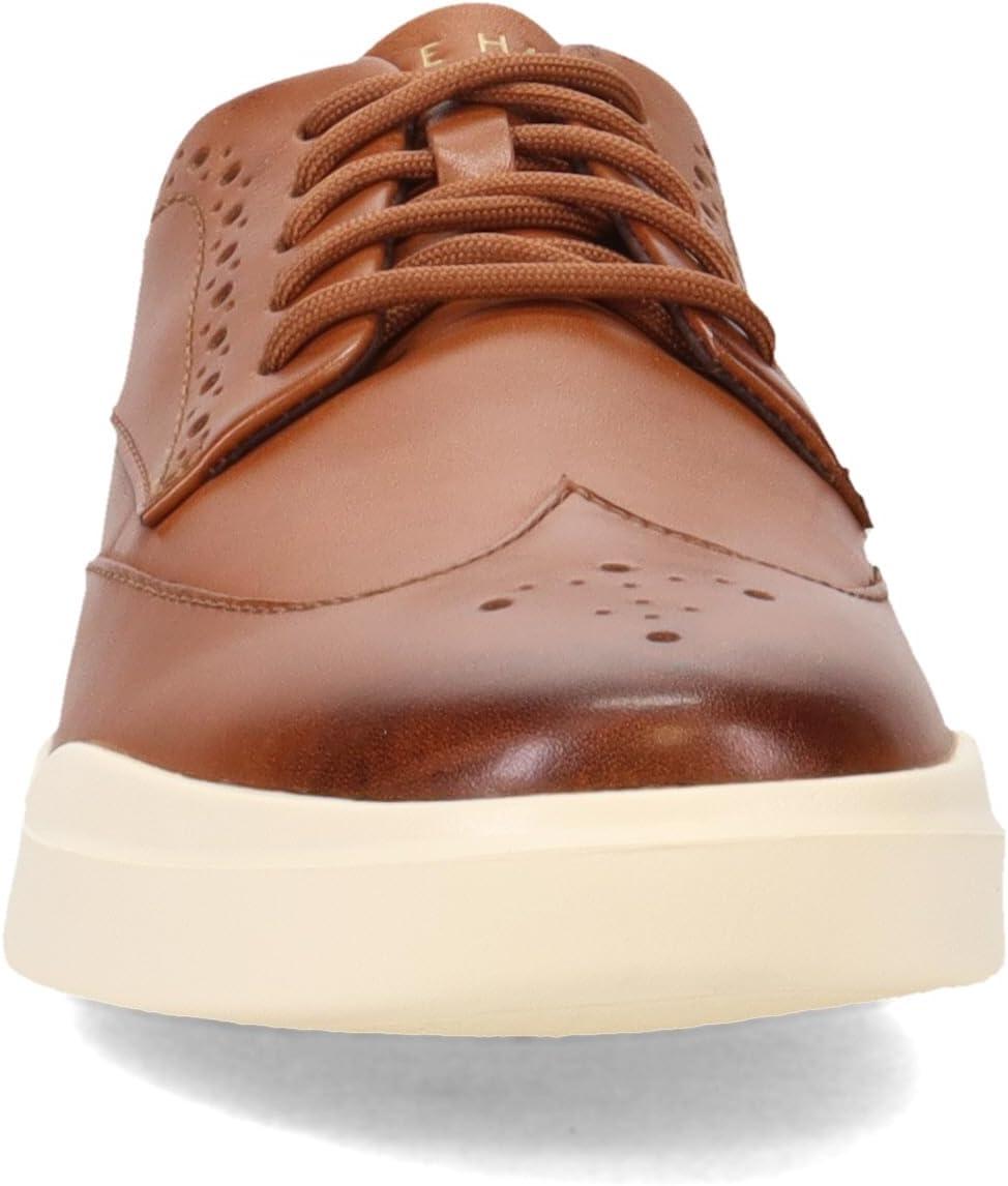 image:imageCole Haan Mens Grand Crosscourt Wingtip SneakerBritish TanIvory