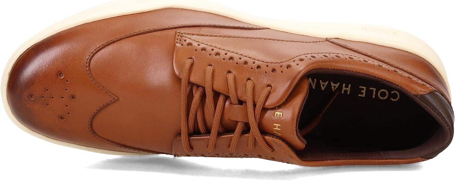 image:imageCole Haan Mens Grand Crosscourt Wingtip SneakerBritish TanIvory