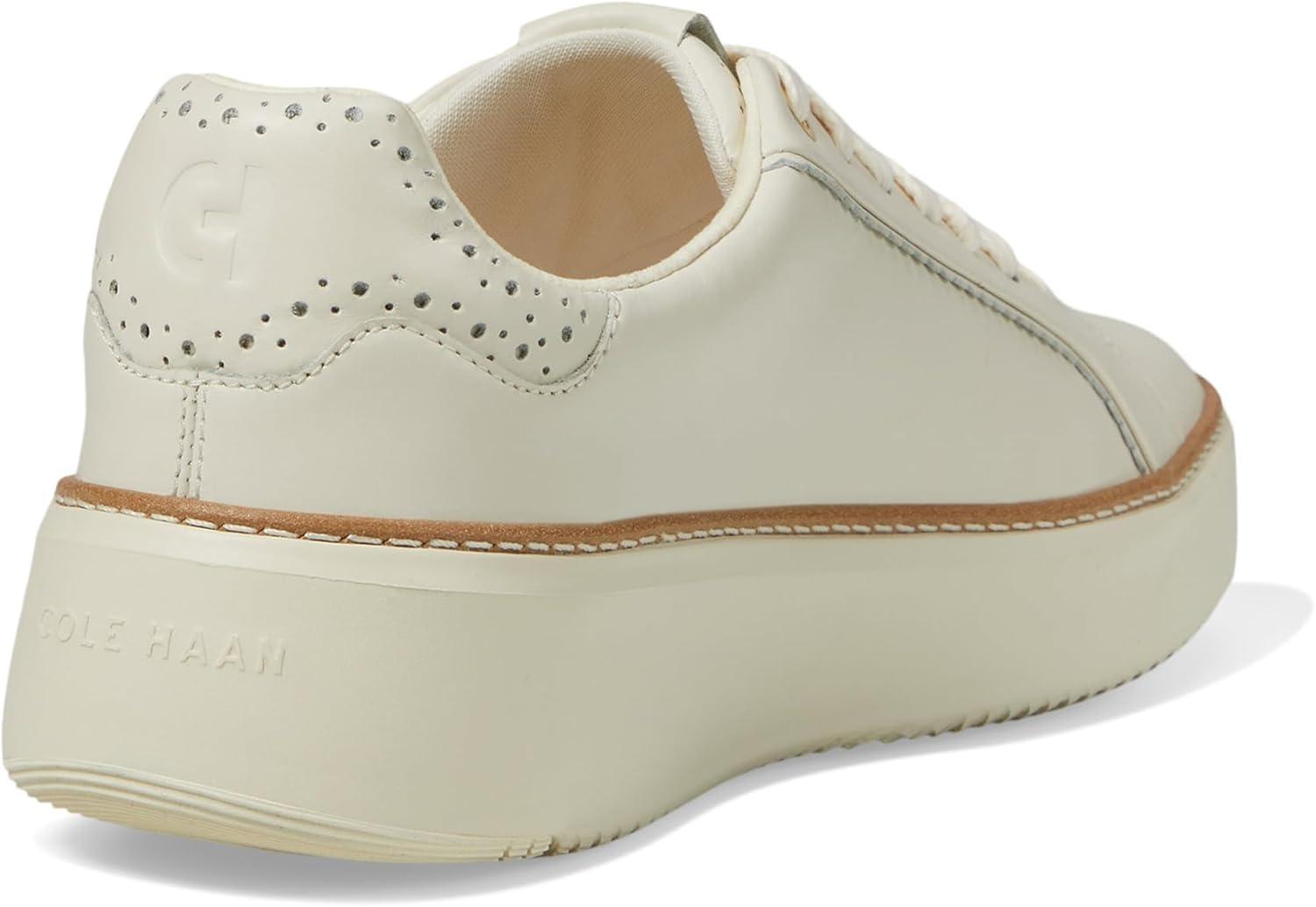 image:imageCole Haan Womens Grandpro Topspin Court SneakerIvory Perf Scallop
