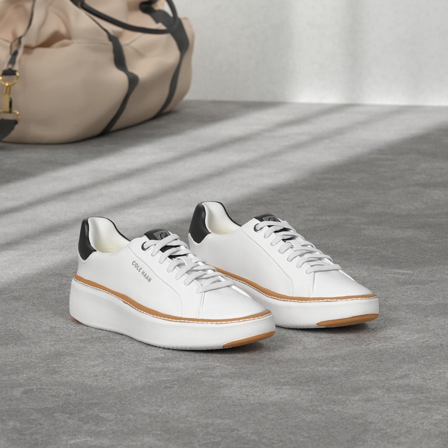 image:imageCole Haan Womens Grandpro Topspin Court SneakerIvoryBlack Leather