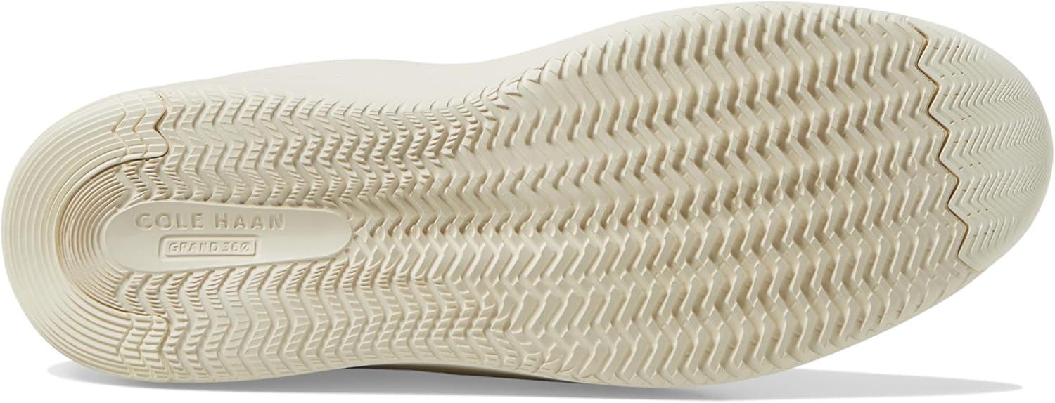 image:imageCole Haan Womens Grandpro Topspin Court SneakerIvoryBlack and Ivory Lizard Print