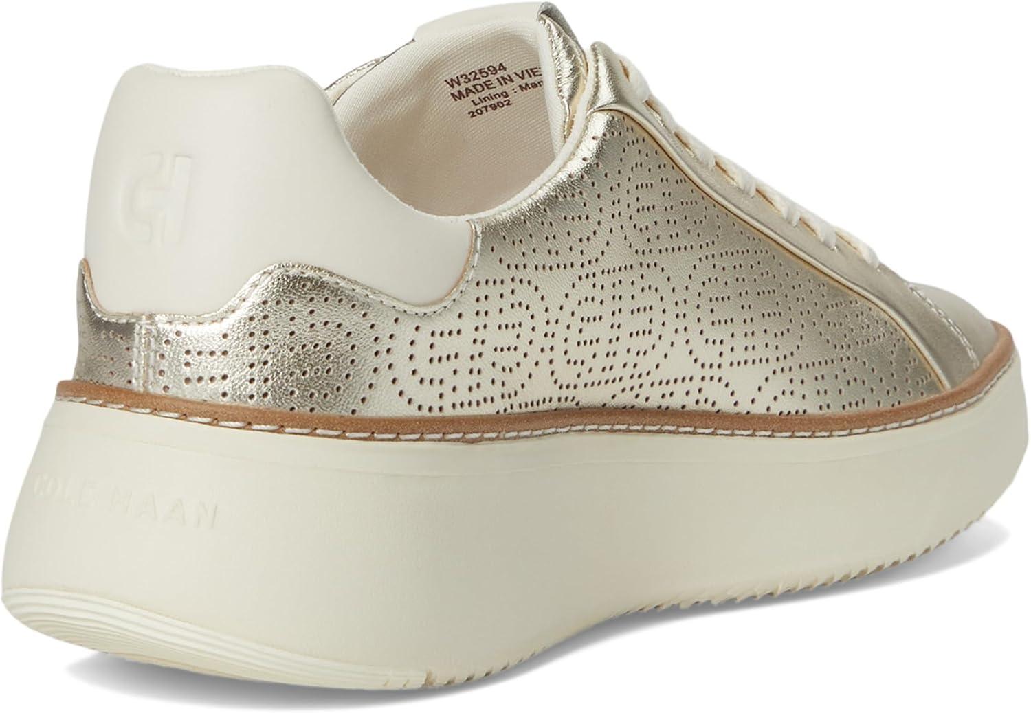 image:imageCole Haan Womens Grandpro Topspin Court SneakerSoft Gold MetallicPerforated Leather