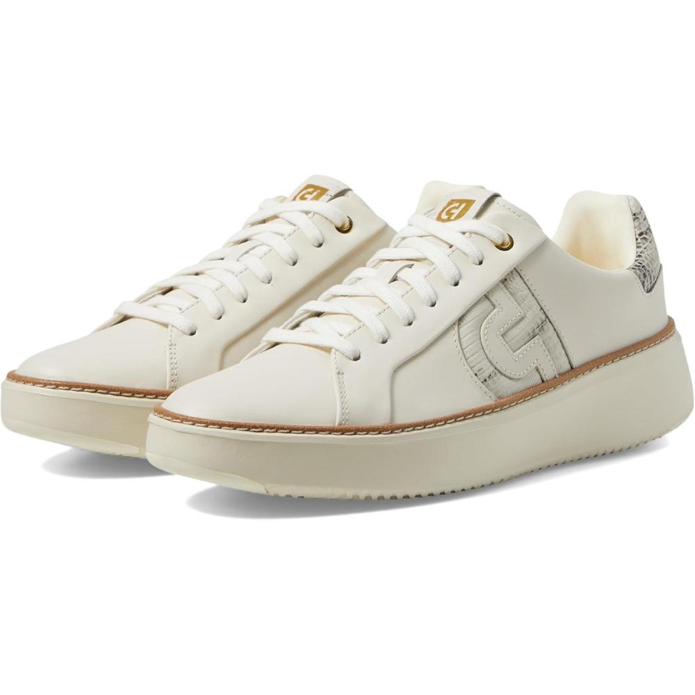 image:imageCole Haan Womens Grandpro Topspin Court SneakerIvoryBlack and Ivory Lizard Print